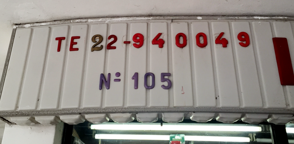 When new digits were added to landlines, some shops improvised to add the extra digit, such as this 2 taken from a door number.