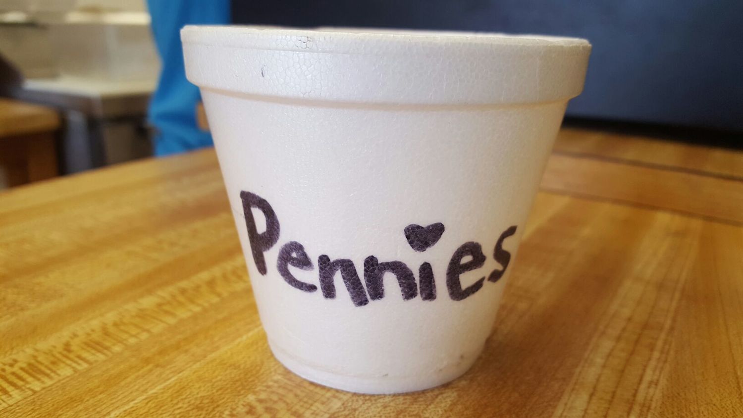 I love the friendly nature of this styrofoam penny cup. The heart over the ‘i’ gives it a sense of compassion, for you’ll always know those pennies will be loved, long after we’re all dead and that styrofoam cup is still sitting in a landfill. Penn♥es. And by the way, when are type designers going to get their act together and start including an alternate i with a heart for the tittle? 