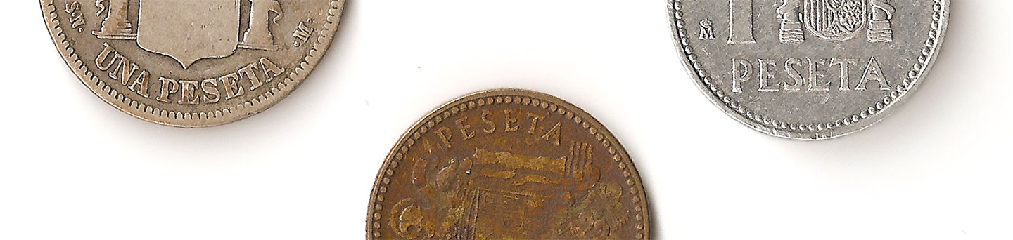 The first models of the peseta coin used a serif typeface, which was later substituted by a glyphic style in later models