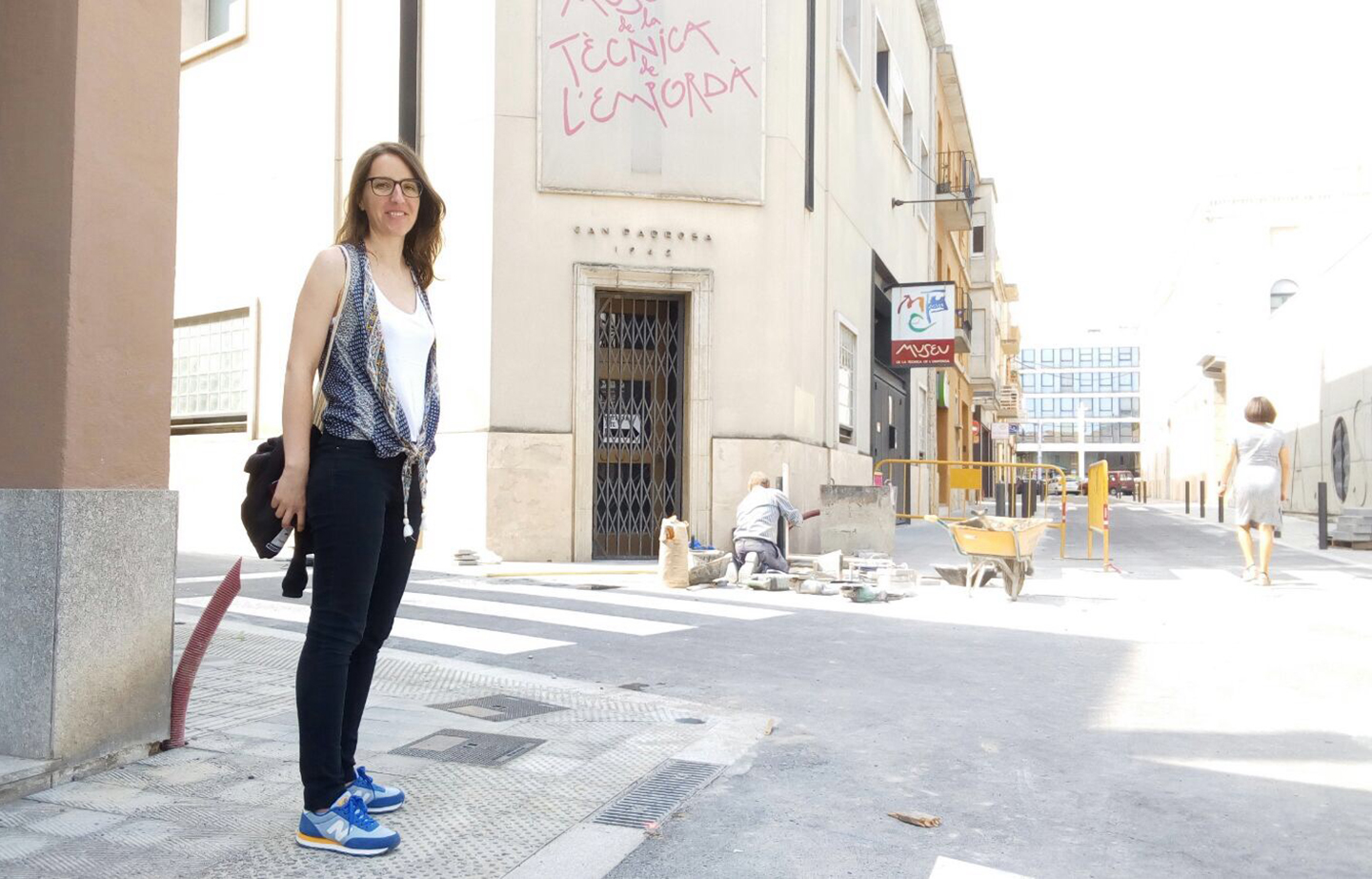 María in front of the museum