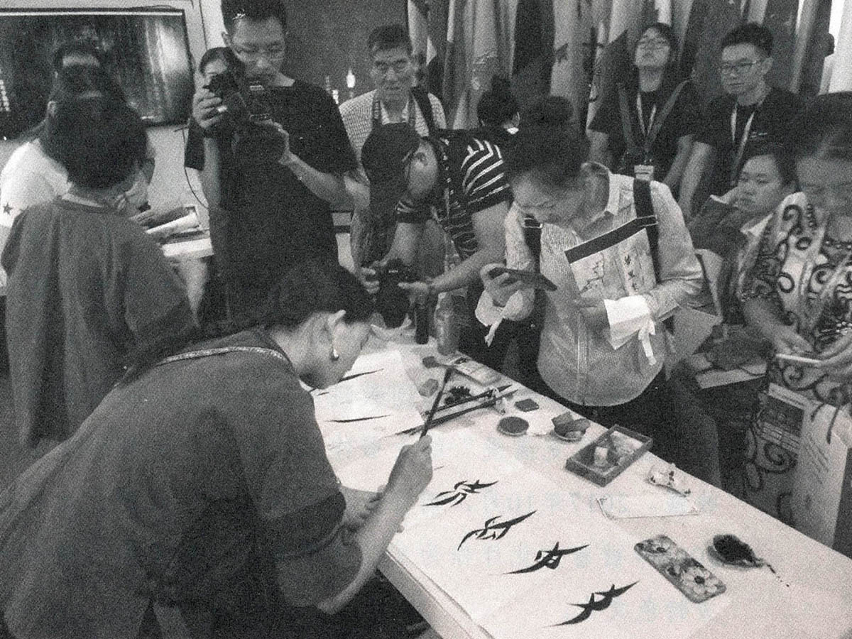 Photograph of a Nüshu calligraphy demonstration