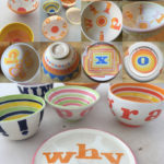 Mugs, bowls and plates. In process and after final glazing